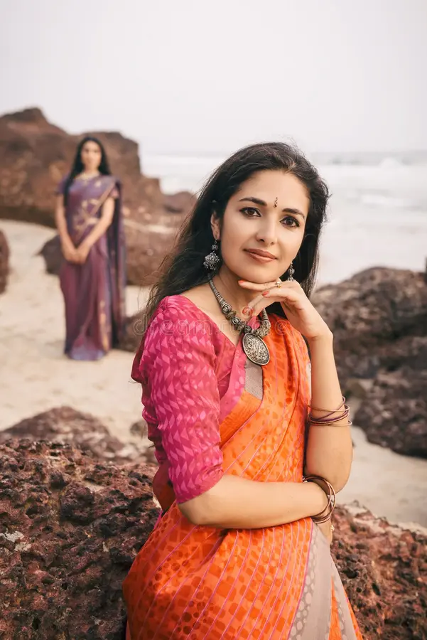 indian-woman-beautiful-saree-fashion-shoot-women-traditional-clothes-standing-rock-near-beach-67240652